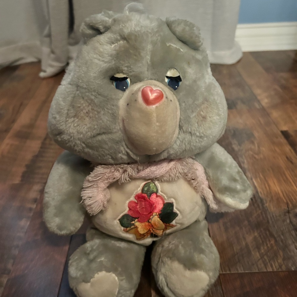 Care Bears Gray Plush with Pink Heart
Vintage. Well kept care bear from 1980’s